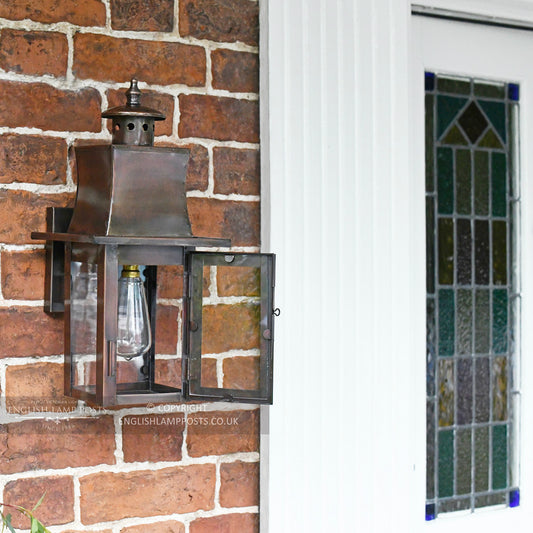 Antique Copper Flush Modern Style Wall Lantern Installed In Front Porchway