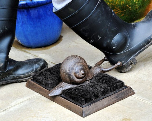 Snail boot remover and boot brush