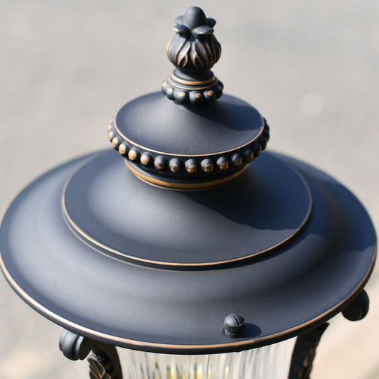 Close up image of finial ornate detail on entrance light