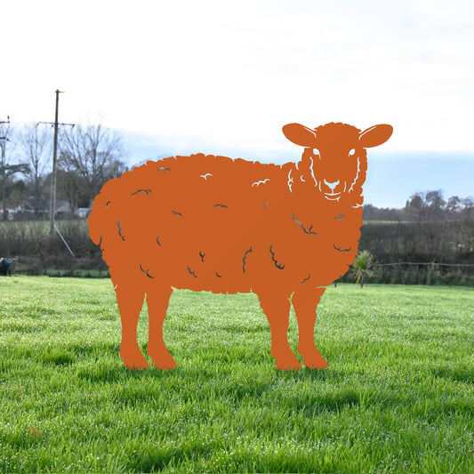 Curly Sheep Sheet Steel Silhouette In Orange In Garden Setting