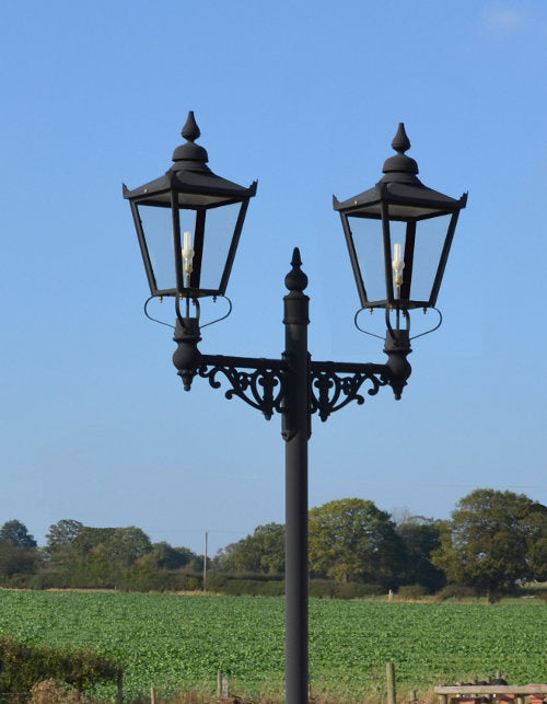 Double headed lamp post in car park