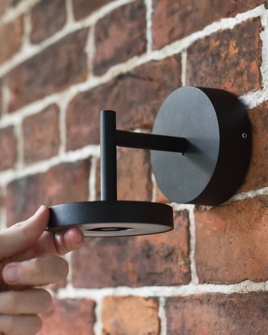 Halo light mounted to a wall