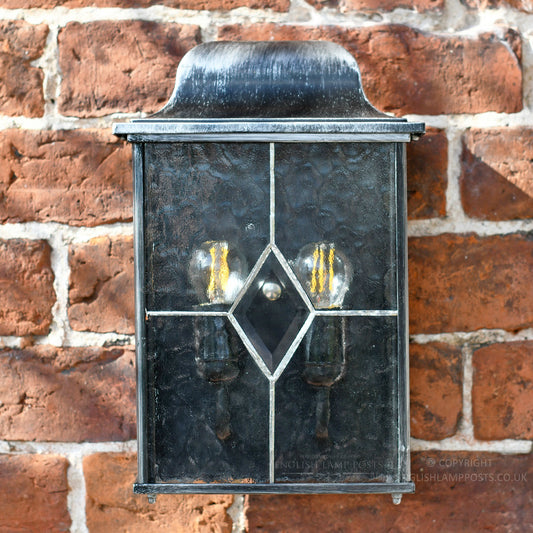 Hand Leaded glass panels on silver garden wall light
