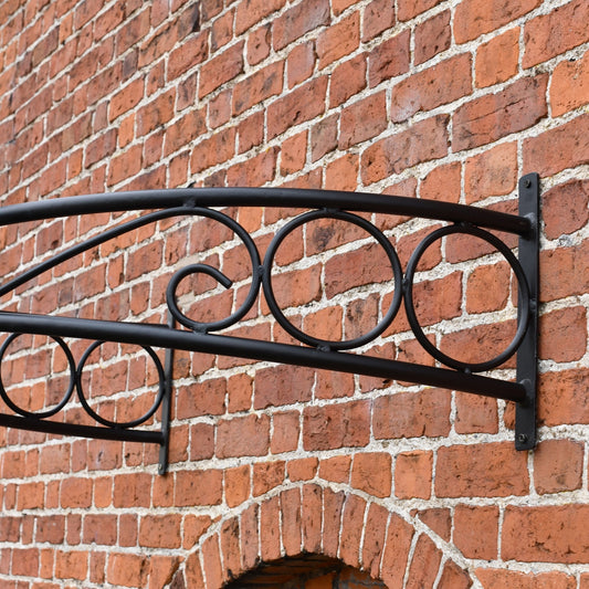 Close view of the ornate bow brackets