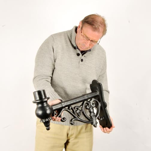 Black Wall Mounted Bracket With Ornate Scrolling