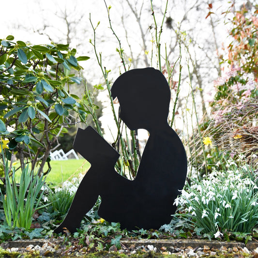 Boy Reading Garden Sheet Steel Silhouette In Black