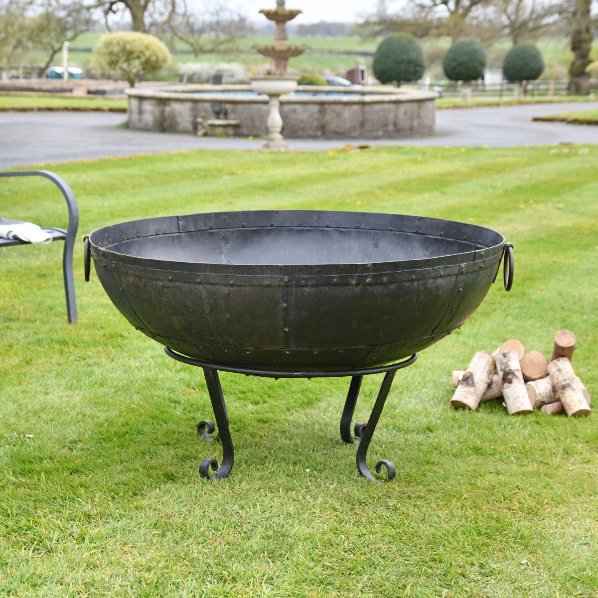 120cm Kadai Fire Bowl in Garden Setting 