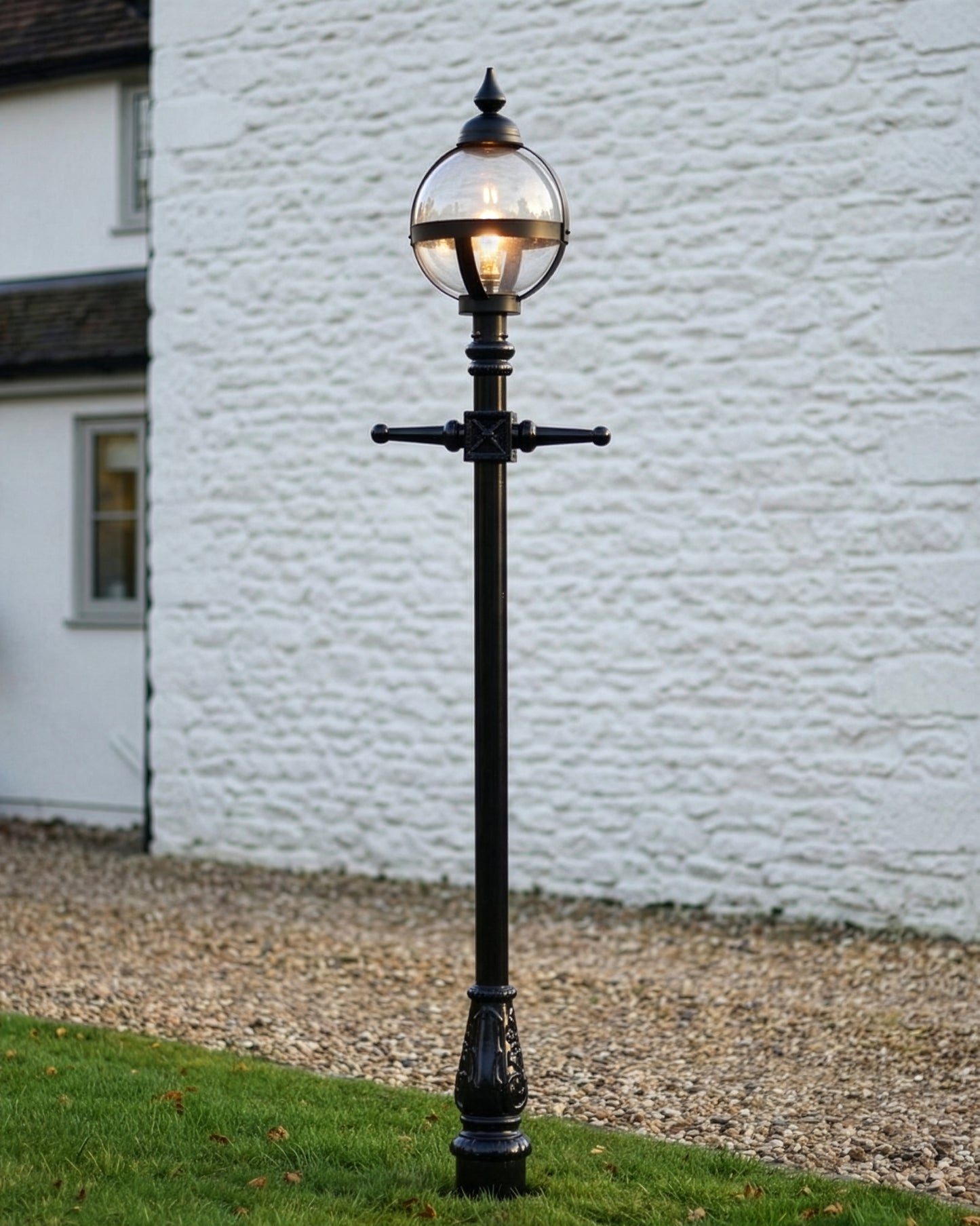 "The Calgary" Glass Globe Garden Lamp Post In A Garden