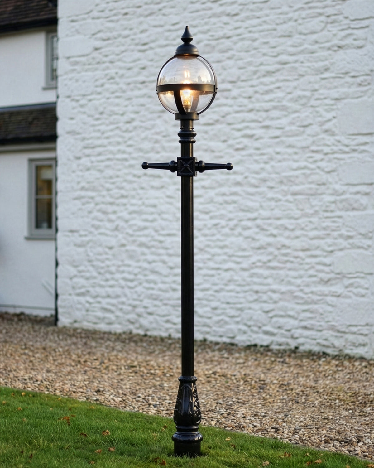"The Calgary" Glass Globe Garden Lamp Post In A Garden