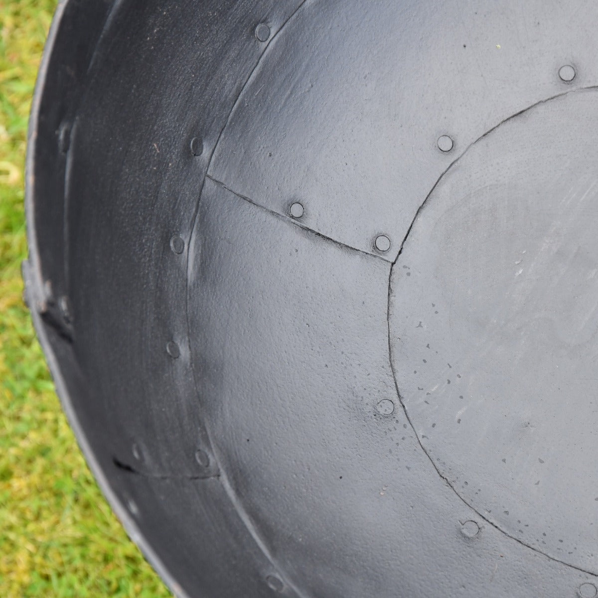 Close up of decorative finish inside Kadai Fire Bowl 