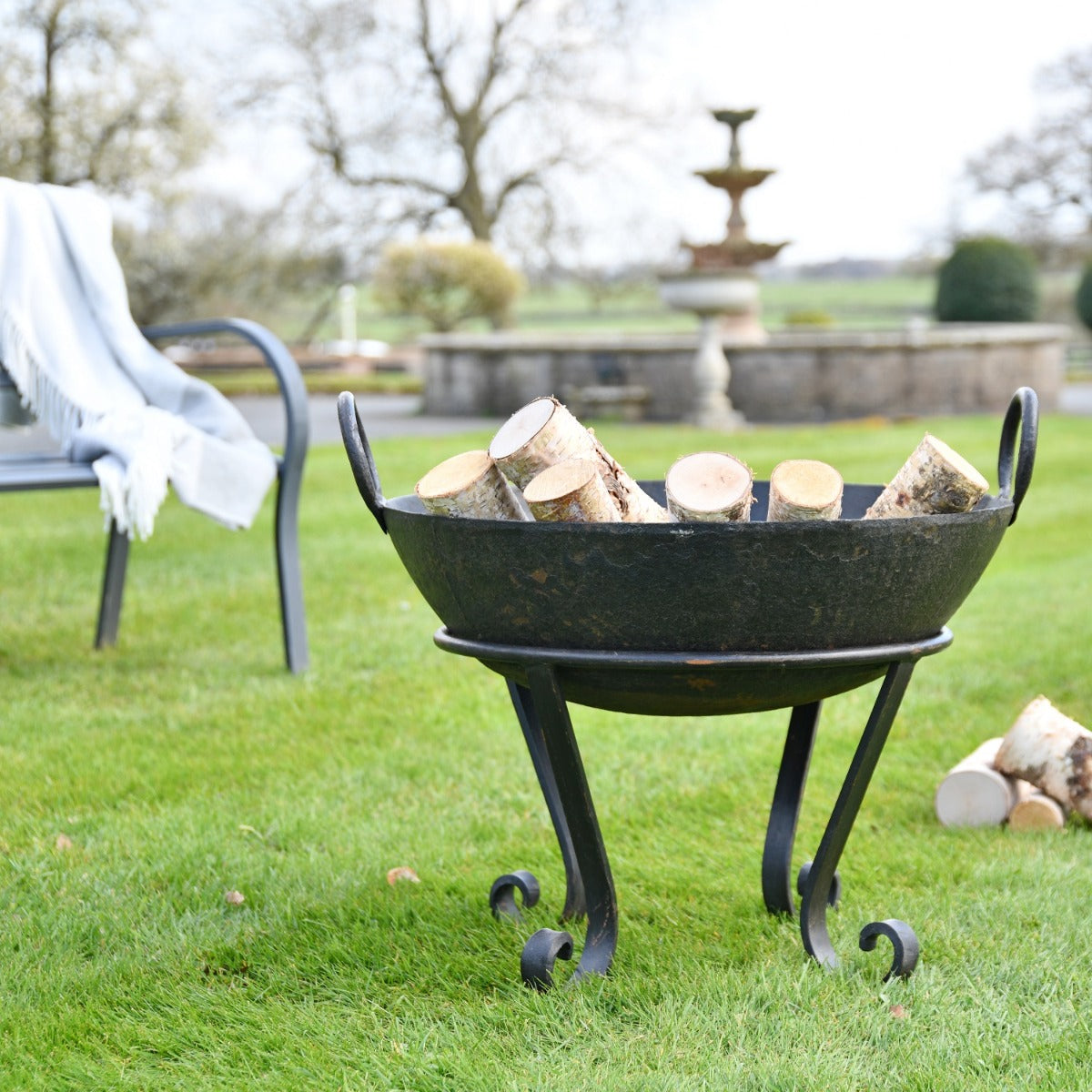 60cm Iron Kadai Fire Bowl in Garden Setting 
