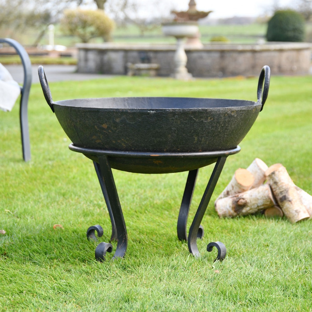 Iron Kadai Fire Bowl in Garden Setting 