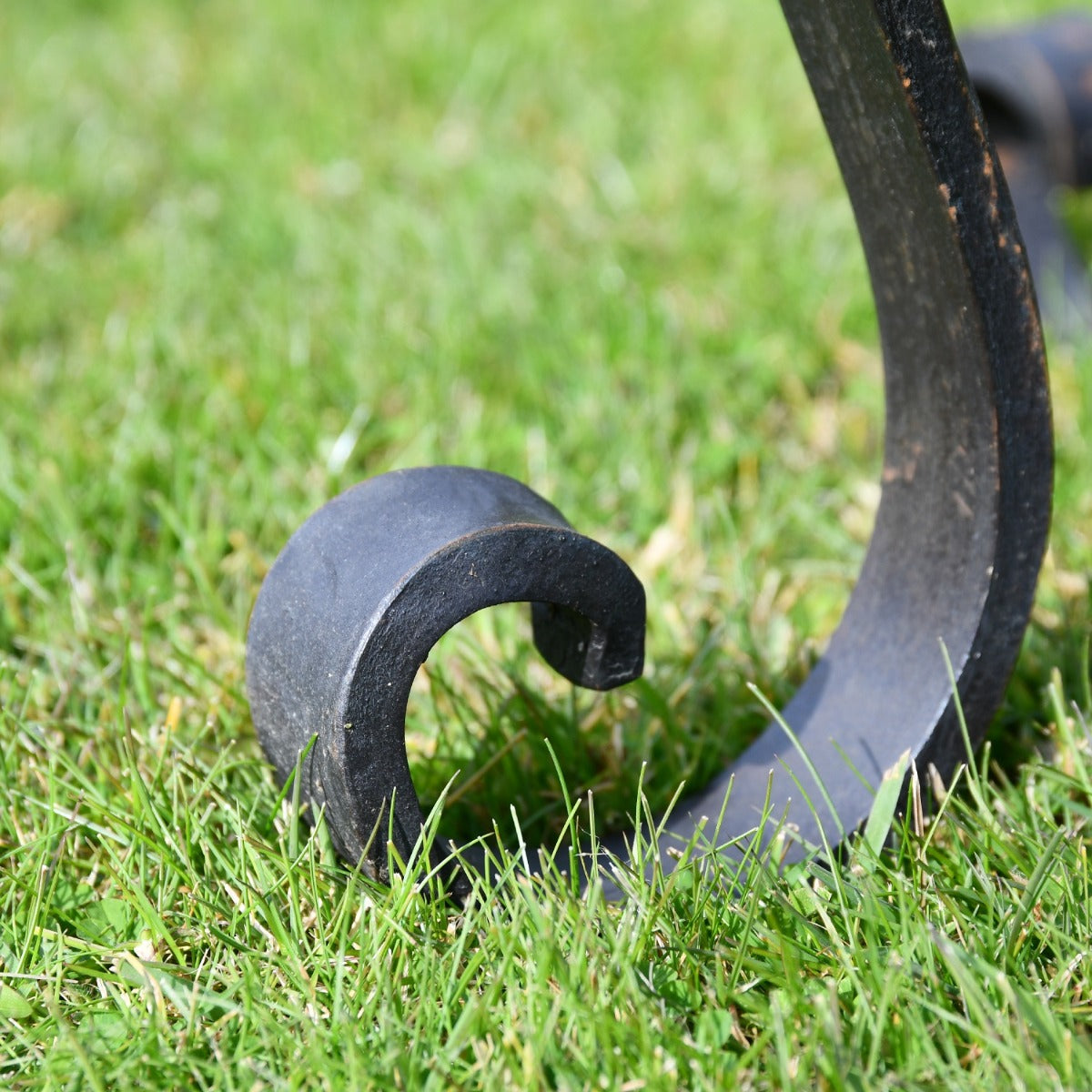 Close up of scroll feet on stand 