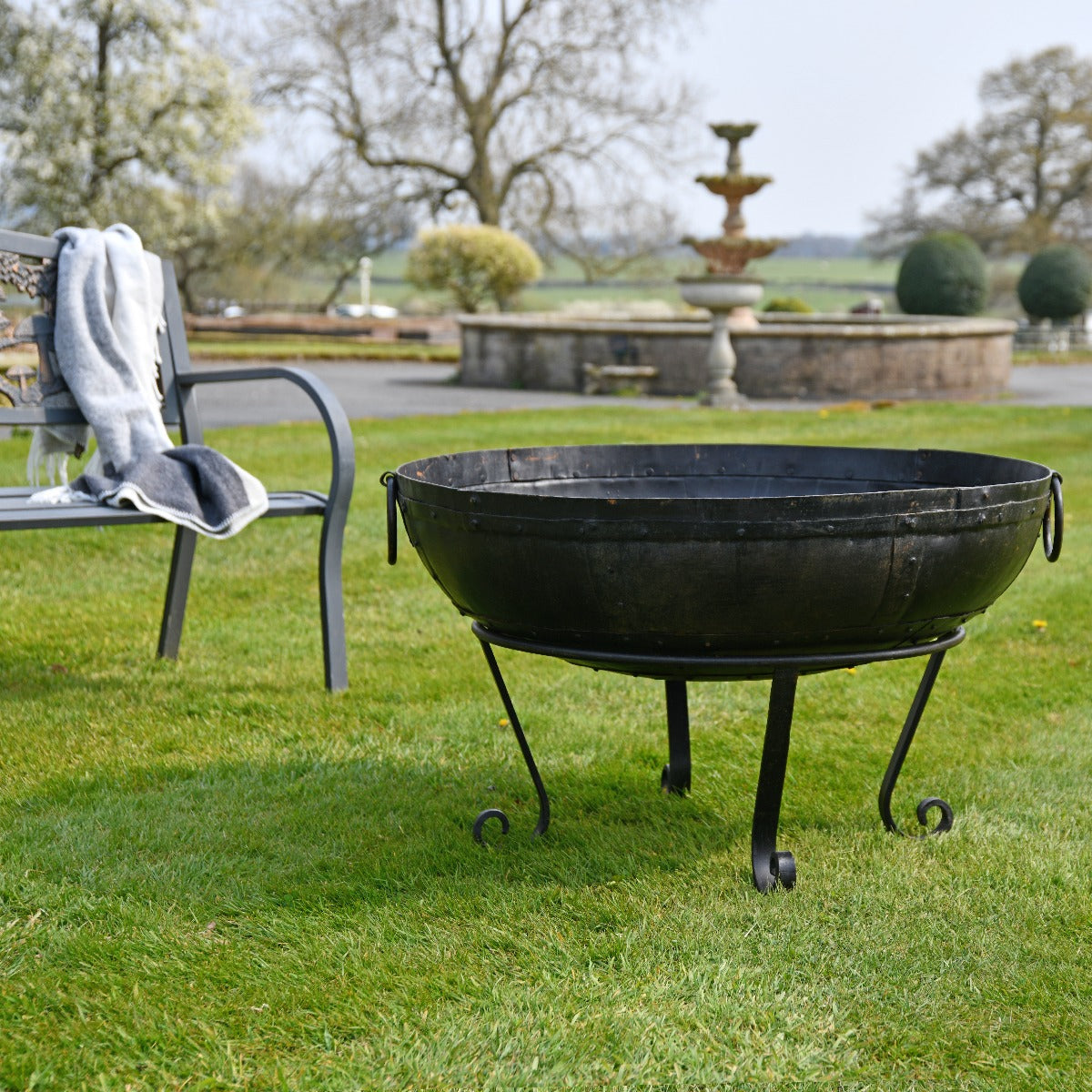90cm Kadai Iron Fire Bowl in Garden Setting 