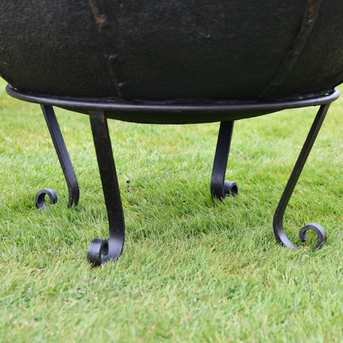 Close up of scroll feet on stand 