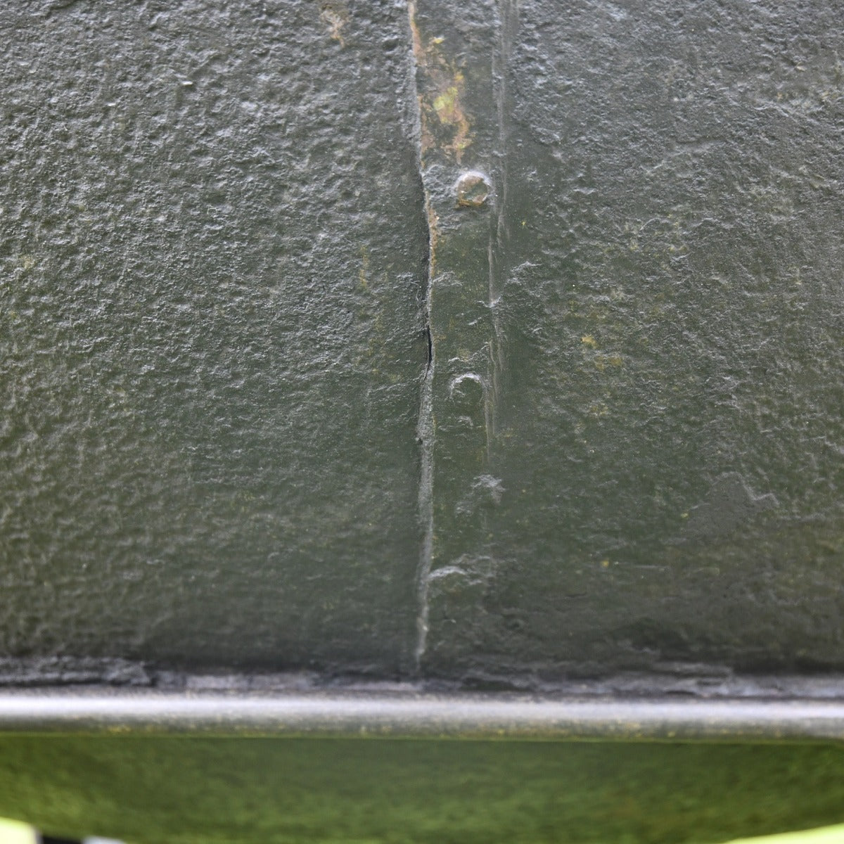 Close up of decorative design on Iron Kadai Bowl 