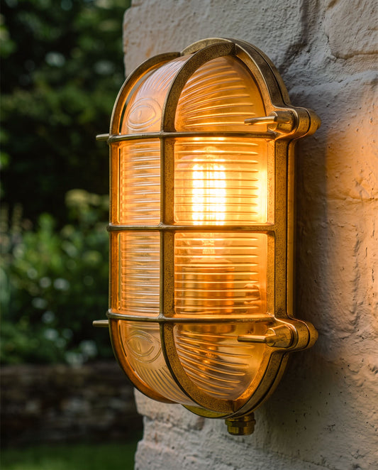 'Tynemouth' Antique Brass Bulkhead Outdoor Wall Light Digital Illustration At Night