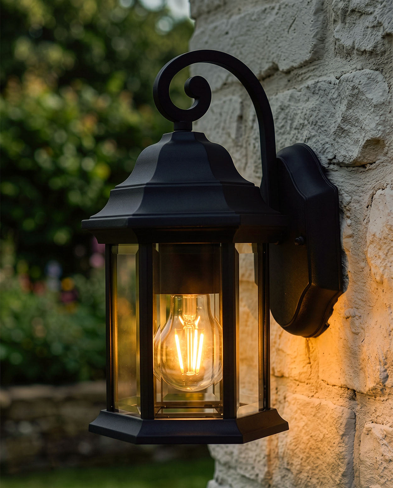'GUILDHOUSE' TRADITIONAL BLACK ORNATE TOP FIX WALL LANTERN  At Night