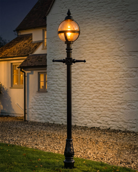 "The Calgary" Glass Globe Garden Lamp Post In A Garden At Night