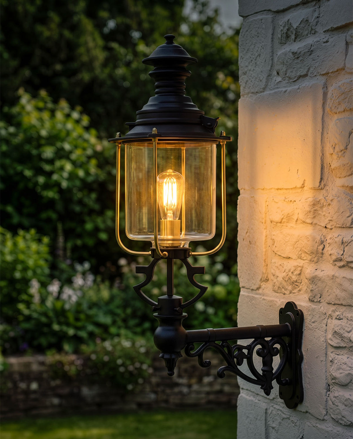 Medium Belgravia Glass Garden Wall Light at Night