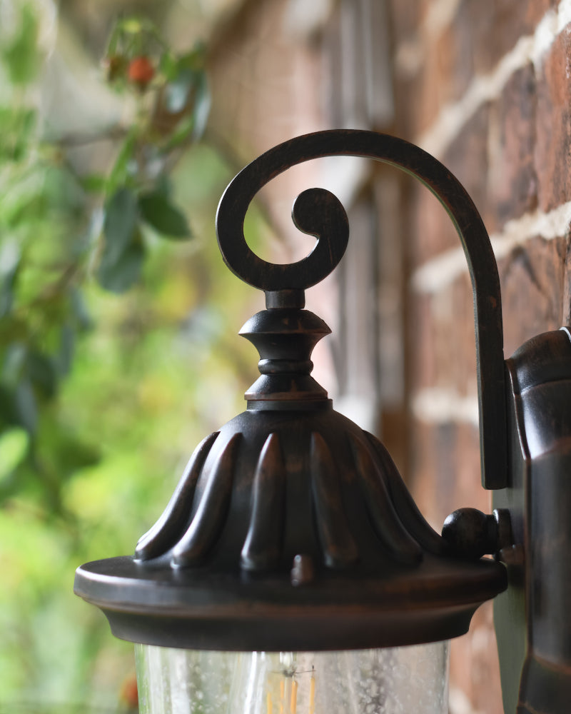Side profile of the ornate wall light apex 
