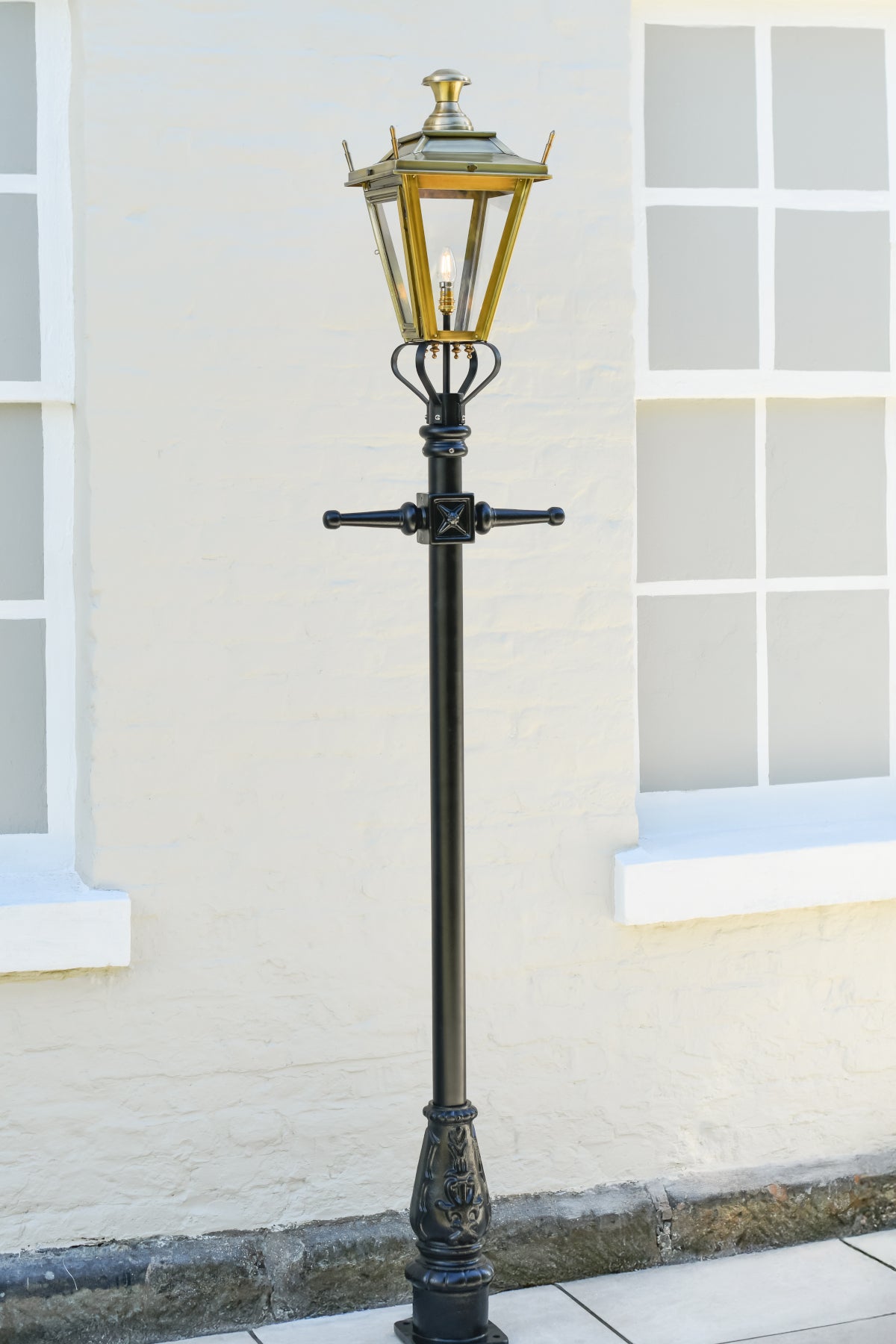 Antique brass Dorchester lantern on black garden lamp post