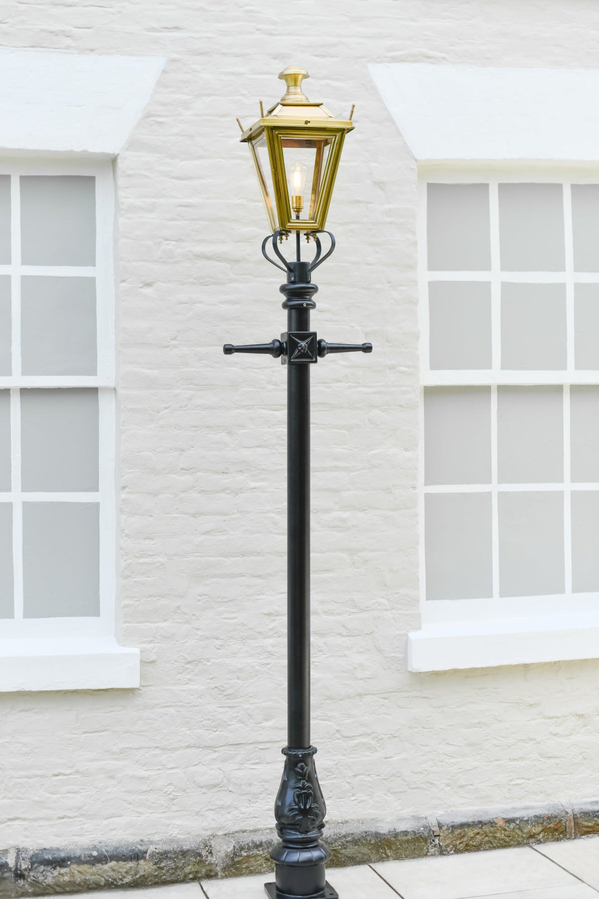 Antique brass lamp post
