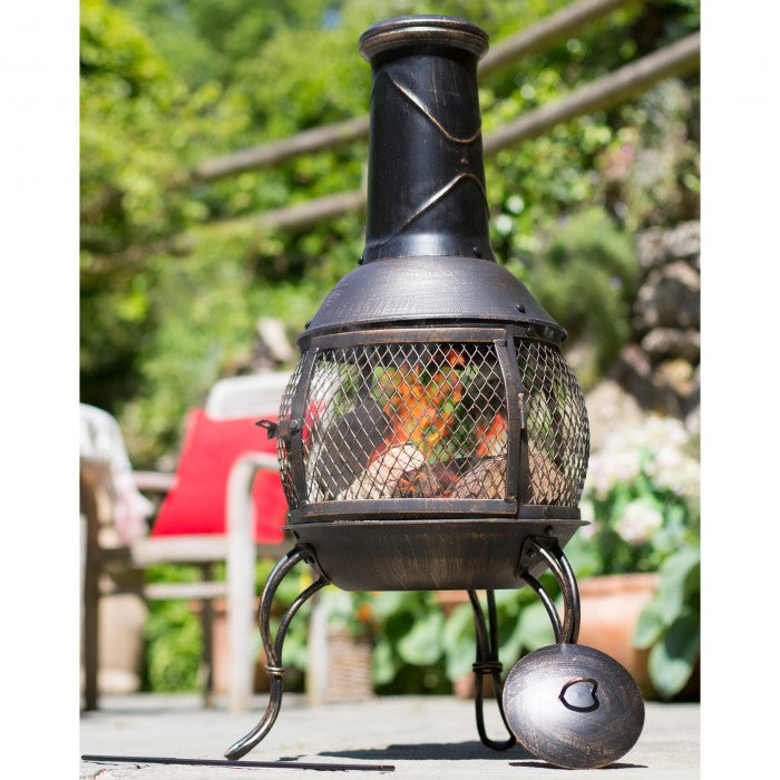 Traditional Antique Bronze Finish Chimenea in situ in the Garden
