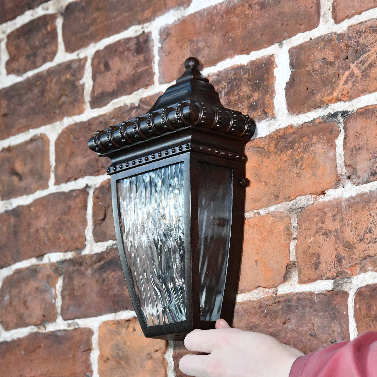 Antique Bronze Half Wall Lantern With Hand For Scale