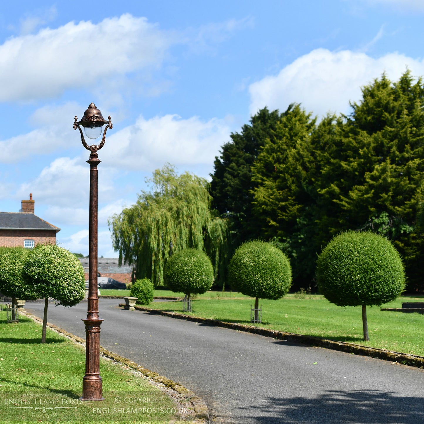 Antique Copper Garden Lamp Post In Garden Setting