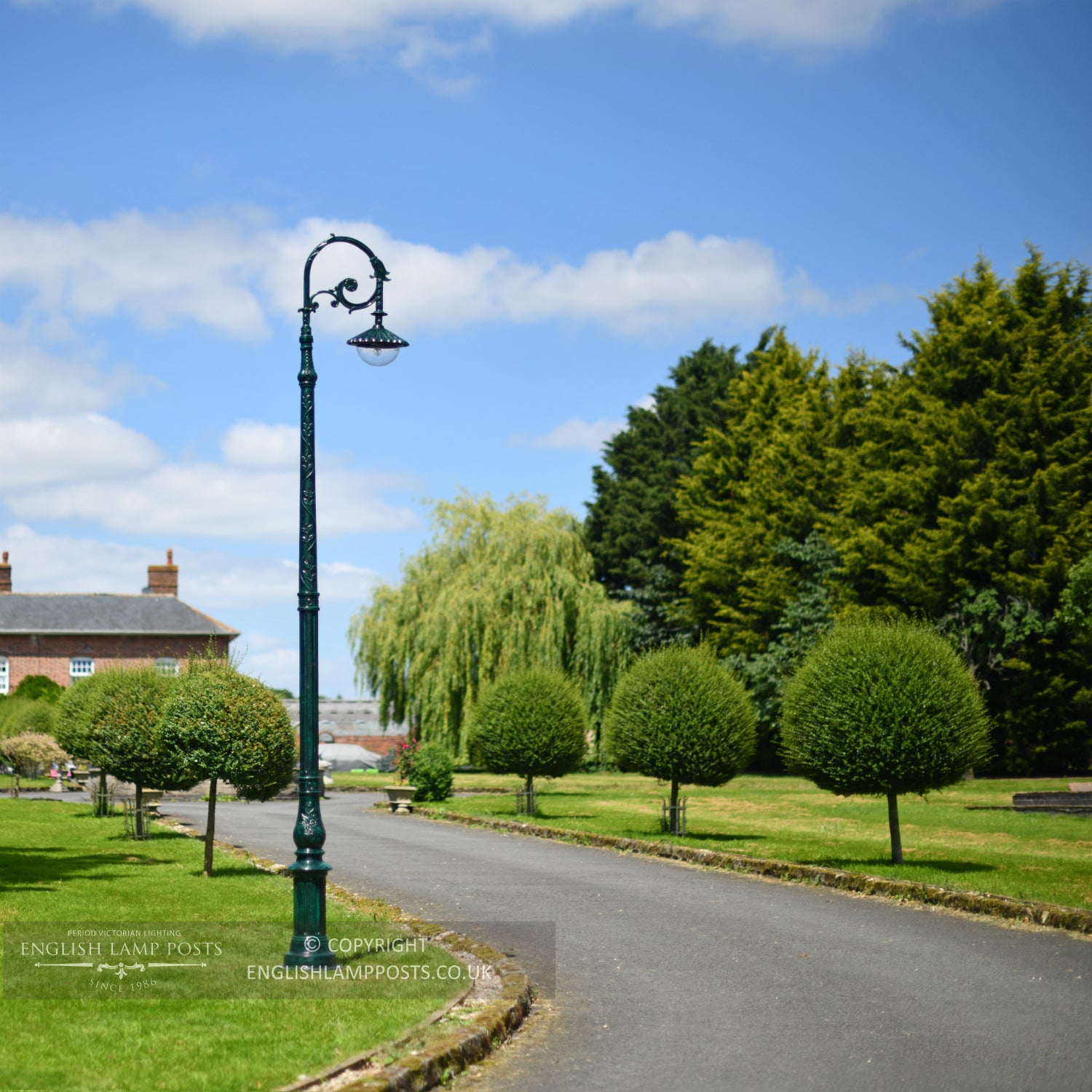 Antique Green Gothic Deluxe Victorian Lamp Post Installed Along Garden Driveway
