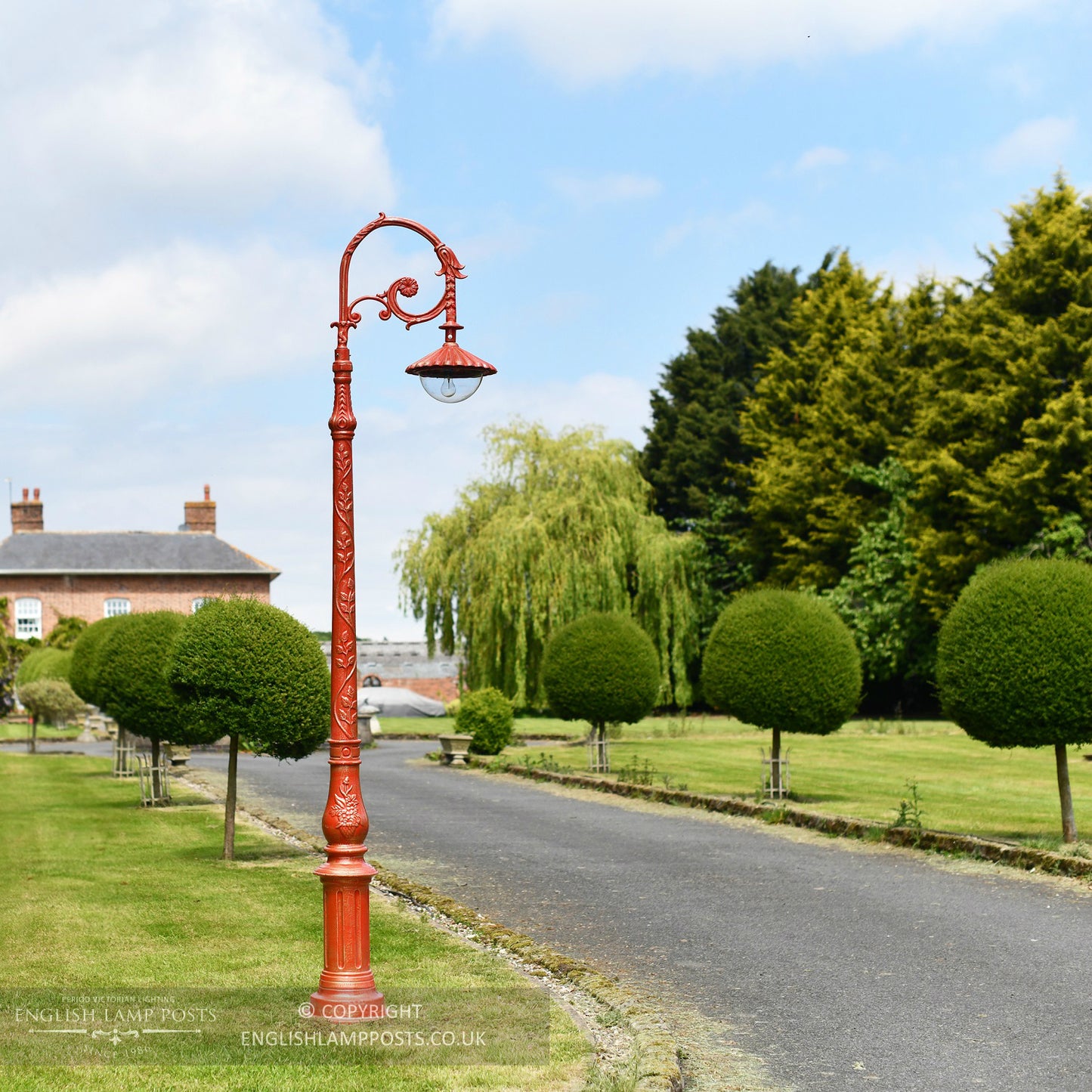 Antique Red Parisian Inspired Lamp Post Installed On Driveway