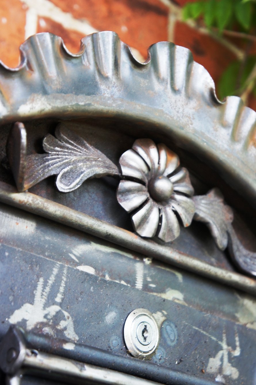 Gothic wall mounted post box close up