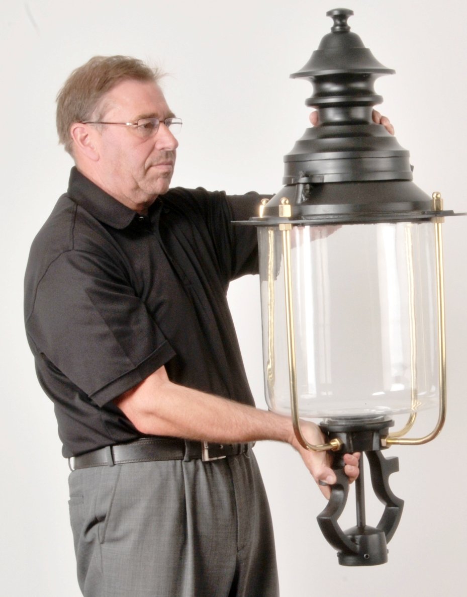 Man holding large Belgravia lantern for scale