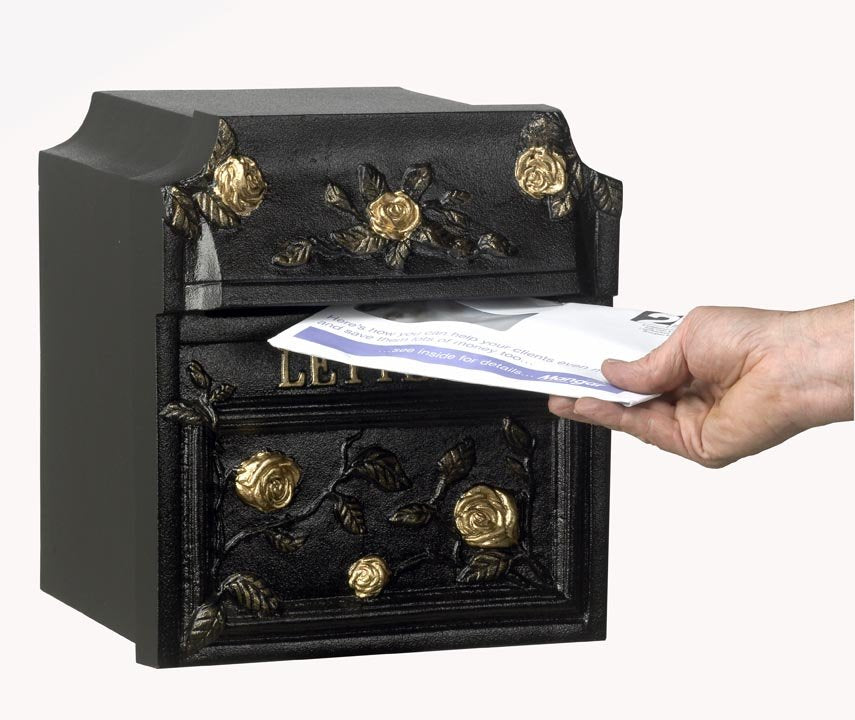 black post and letter box on stand
