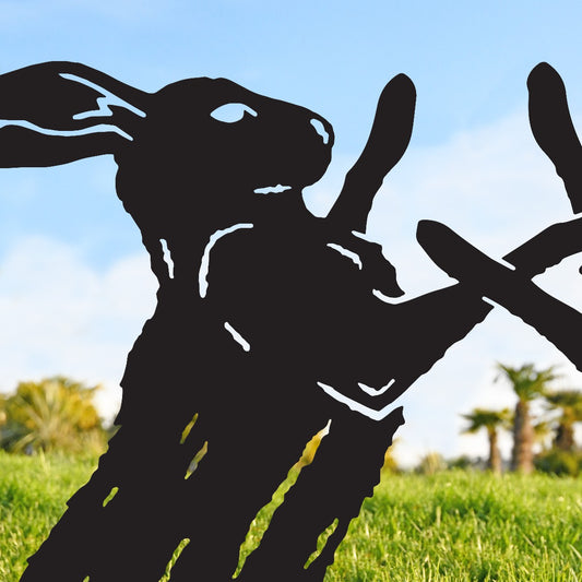 Close Up Of Large Boxing Hares Garden Sheet Steel Silhouette In Black
