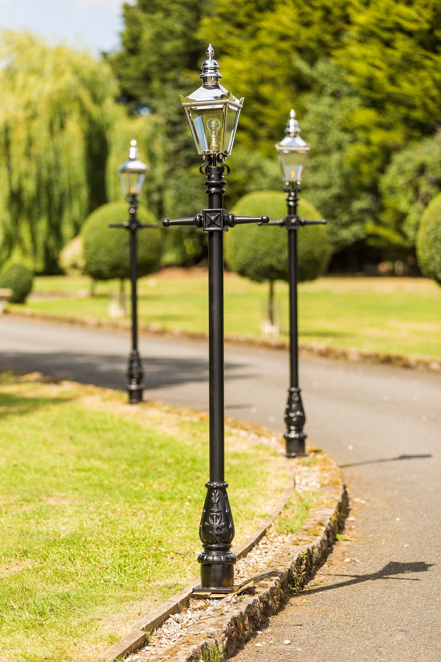 Bright Chrome Lantern On Black Cast Iron Lamp Post Column