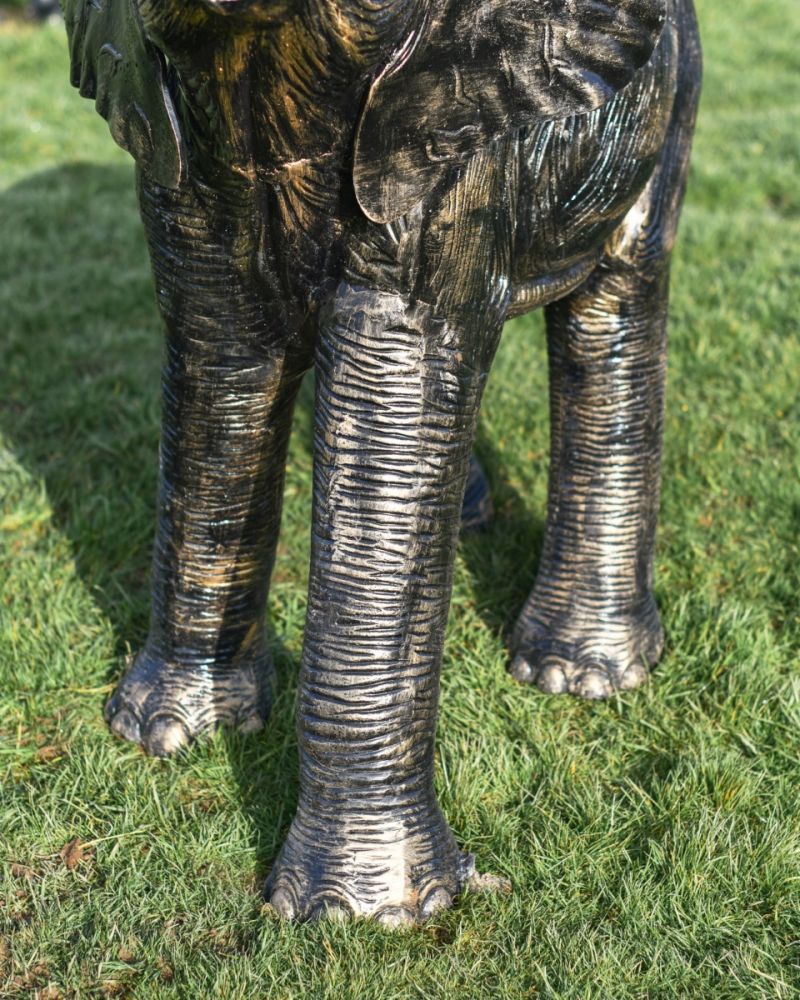View of the brushed black and gold feet