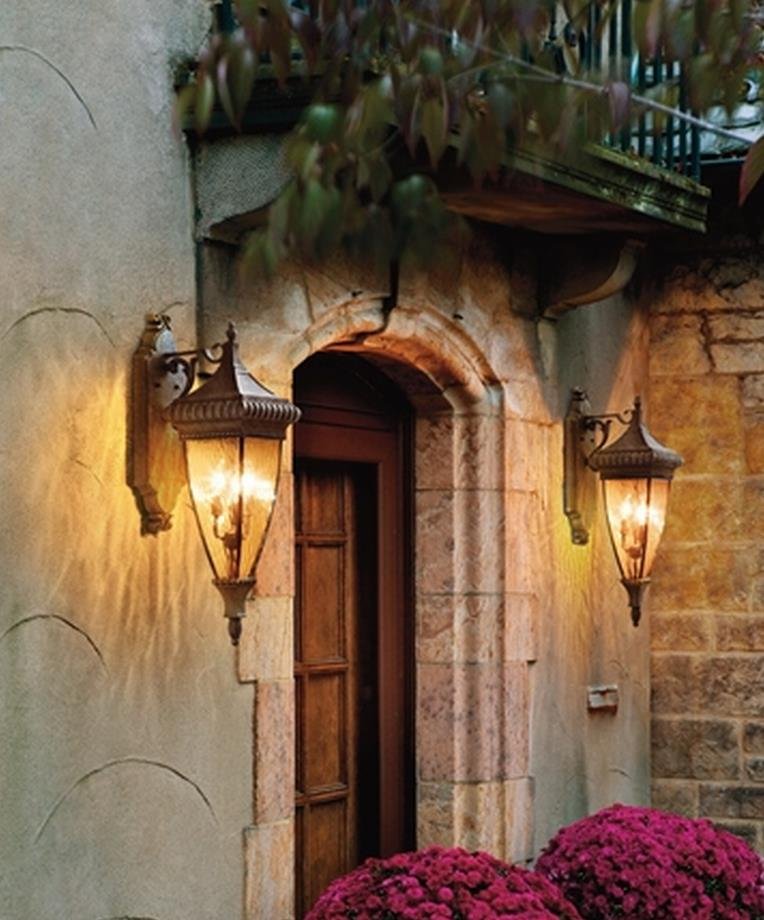 Two Brushed Bronze Renaissance Style Wall Lanterns On Wall