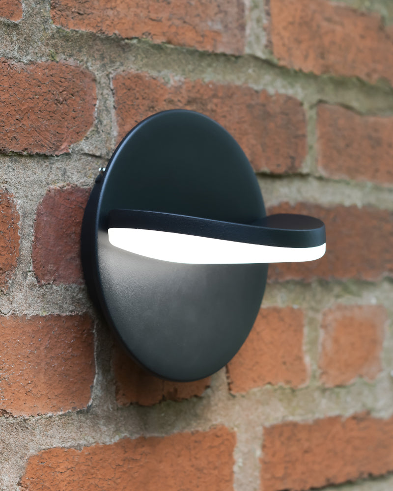 Three quarter profile of the light being mounted to the wall