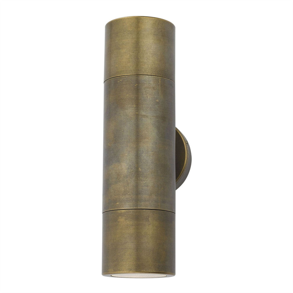The antique brass wall light on a white background