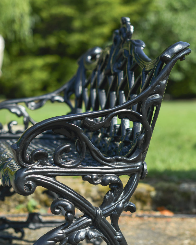 Side profile of the scrolled armrests