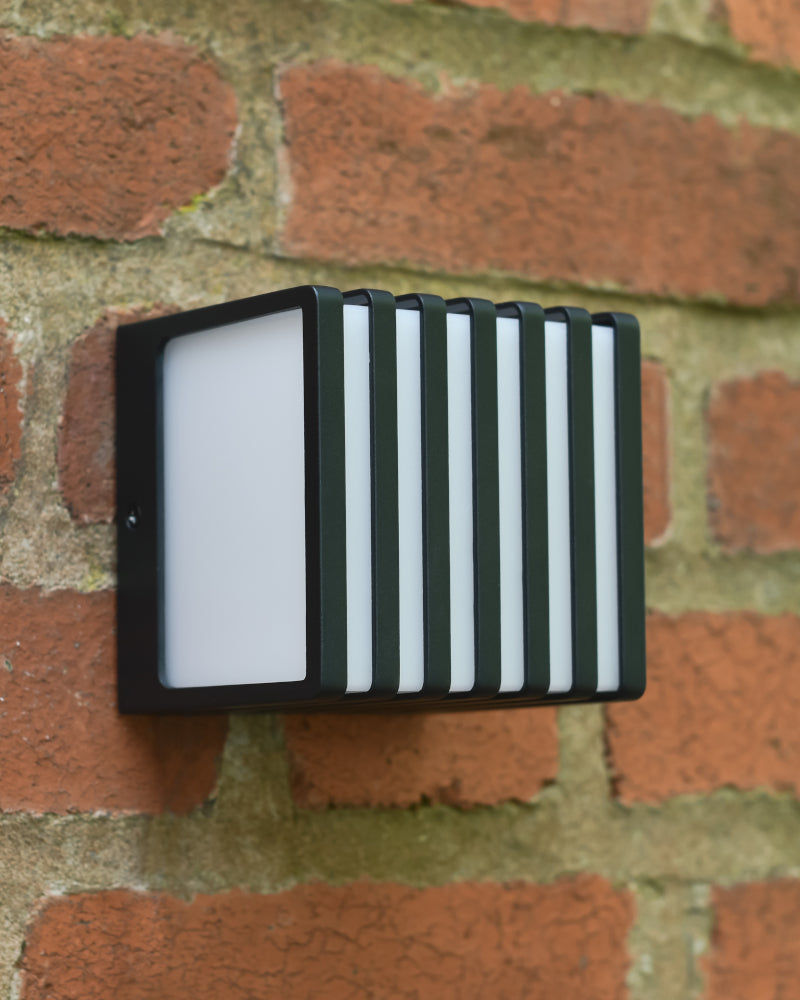 Angled view of the 'Carnfield' wall mounted to a red brick wall