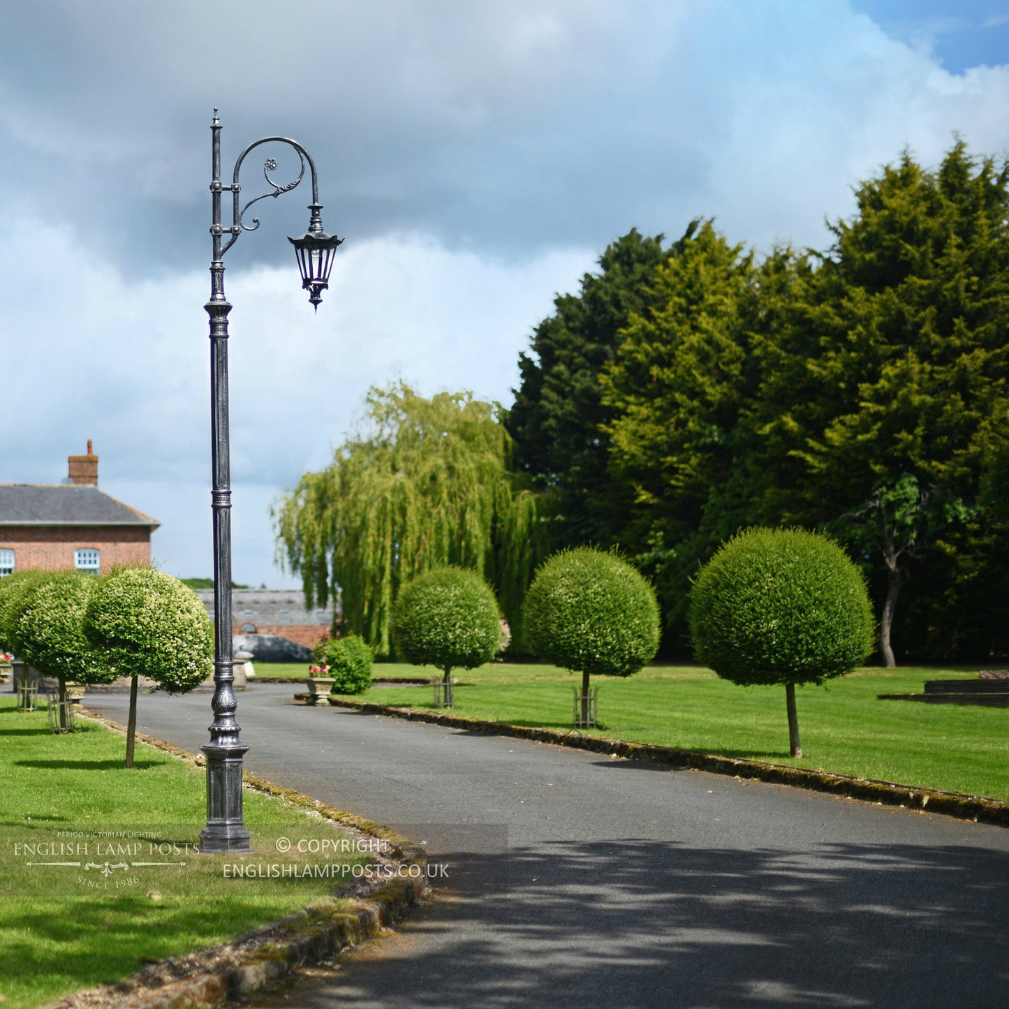Cast Iron Lamp Post Column In Garden Setting
