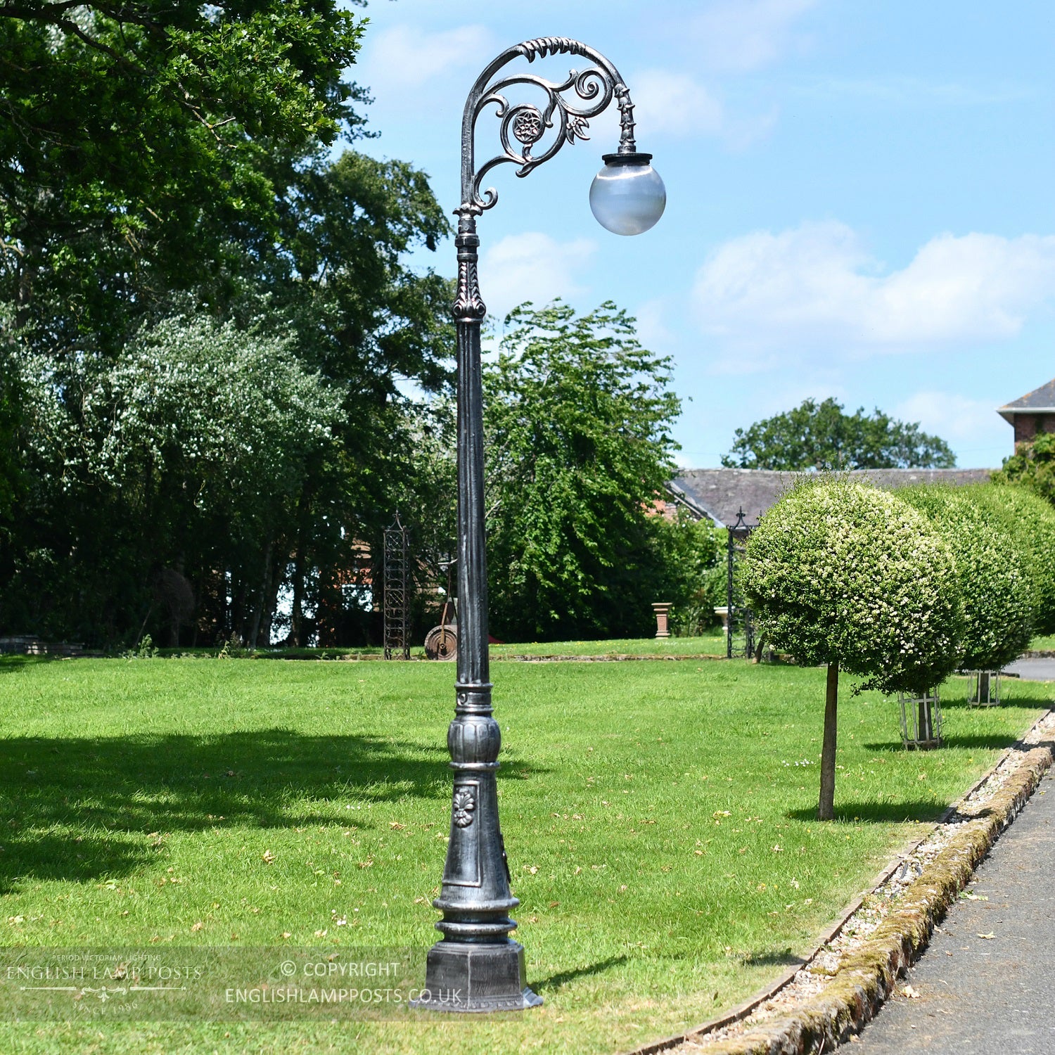 Cast Iron Silver Lamp Post Column In Garden Setting