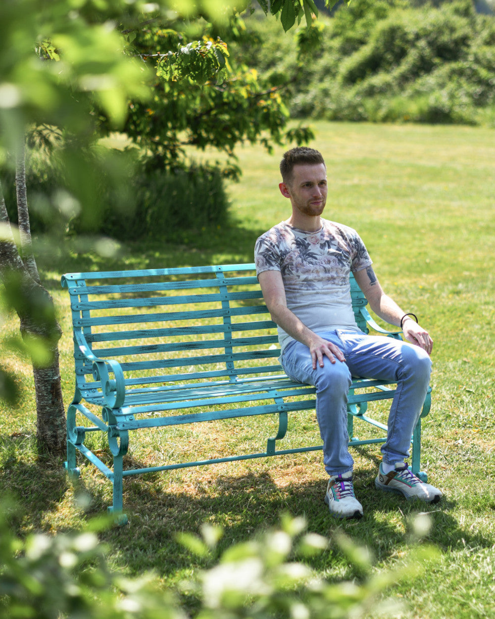 Green two-seater bench