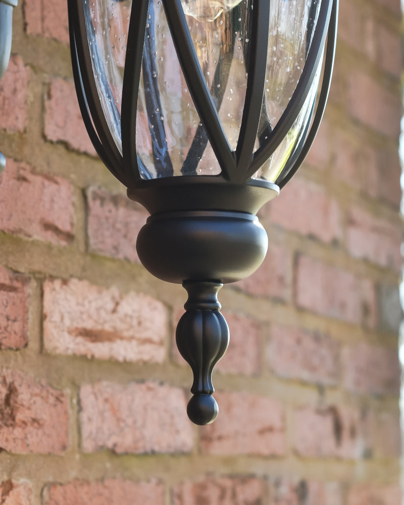 View of the decorated base of the wall light 