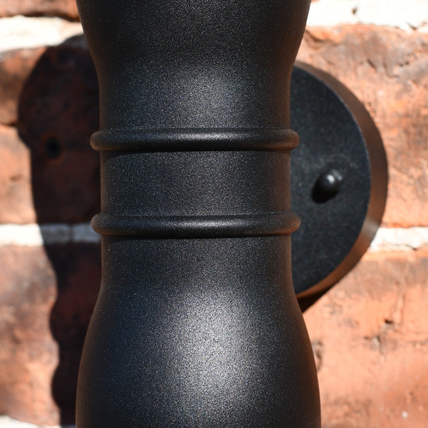 Close Up of Black Contemporary Up and Down Wall Light