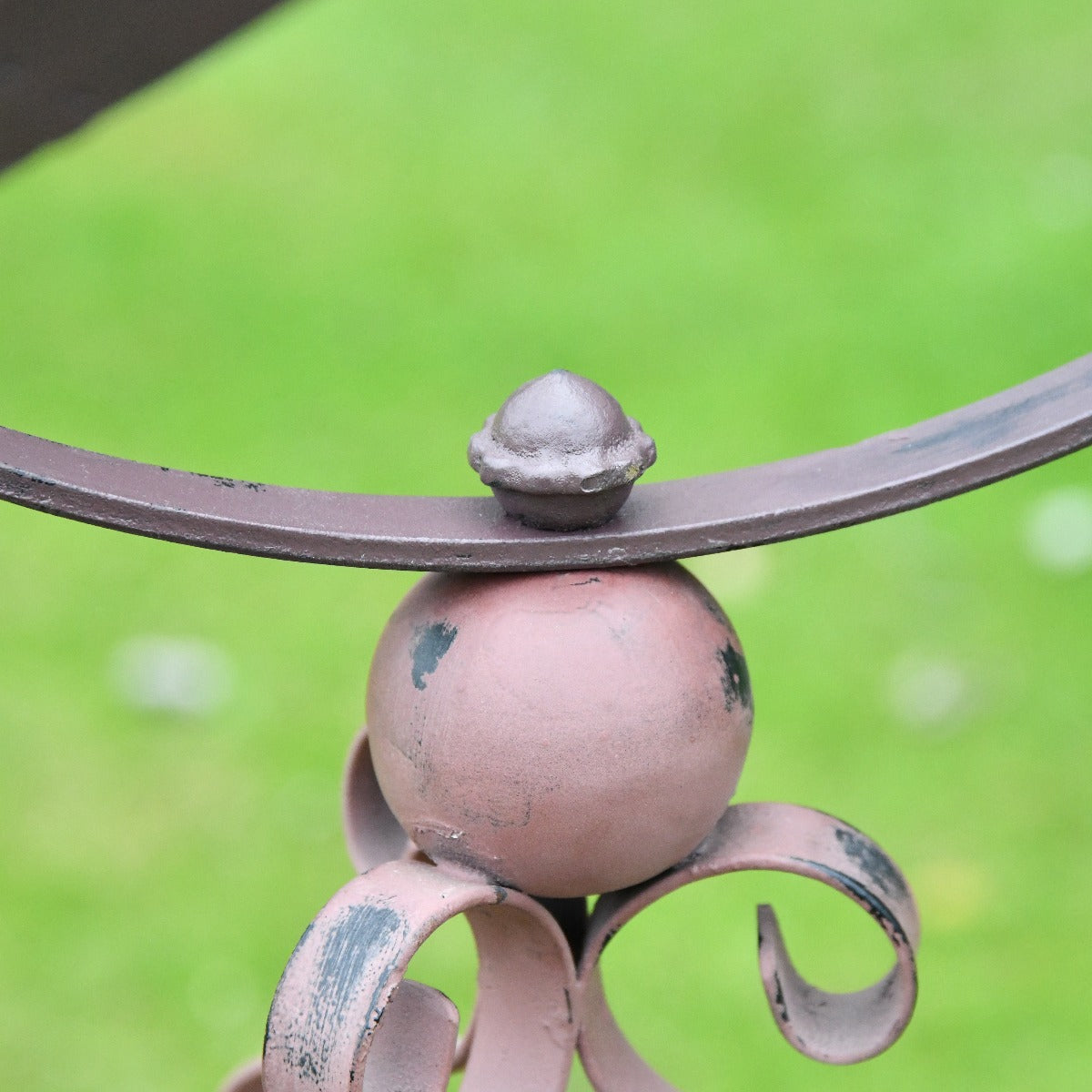 Close Up Of Detailing On Antique Iron Garden Armillary