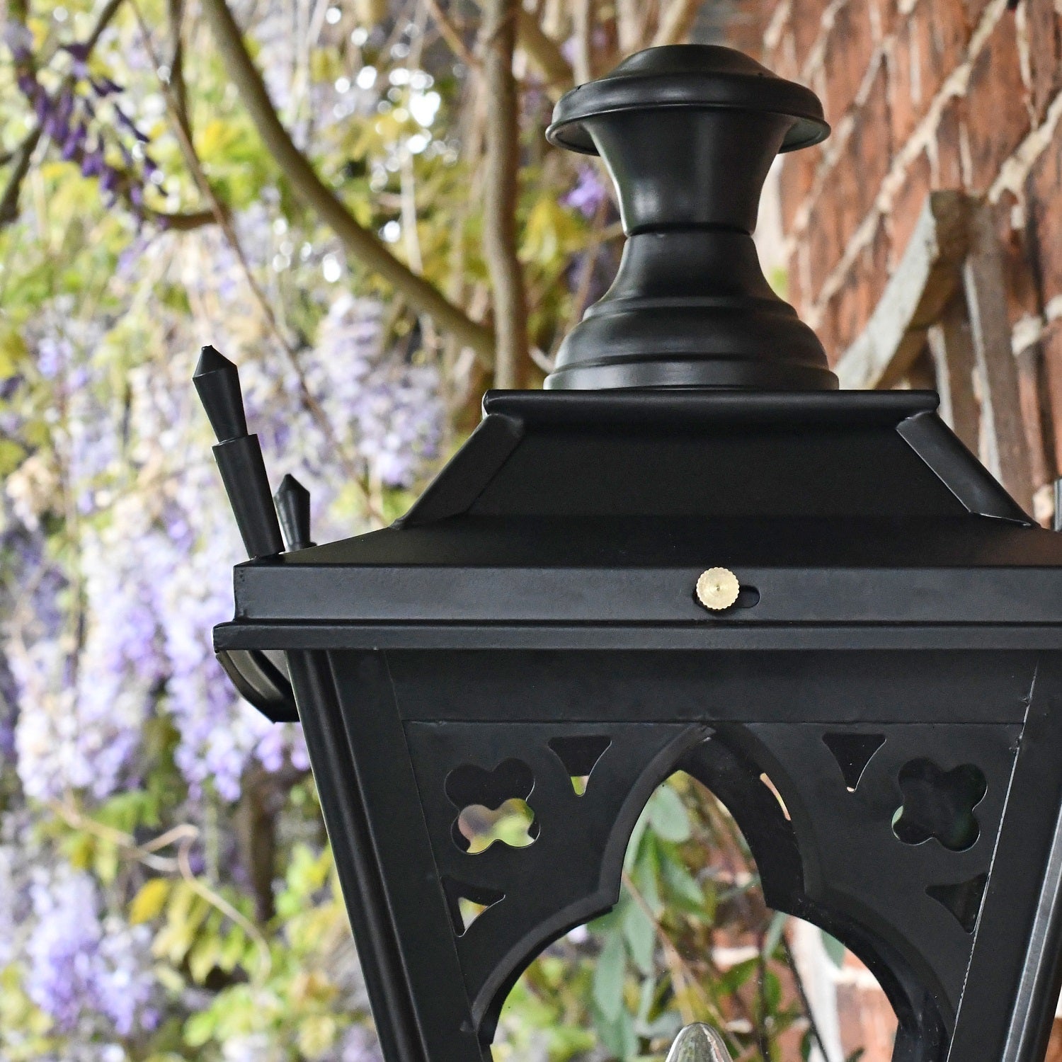 Close up of gothic detailing on black lantern